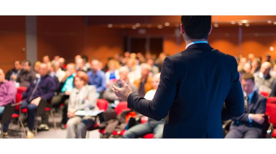 man speaking to group