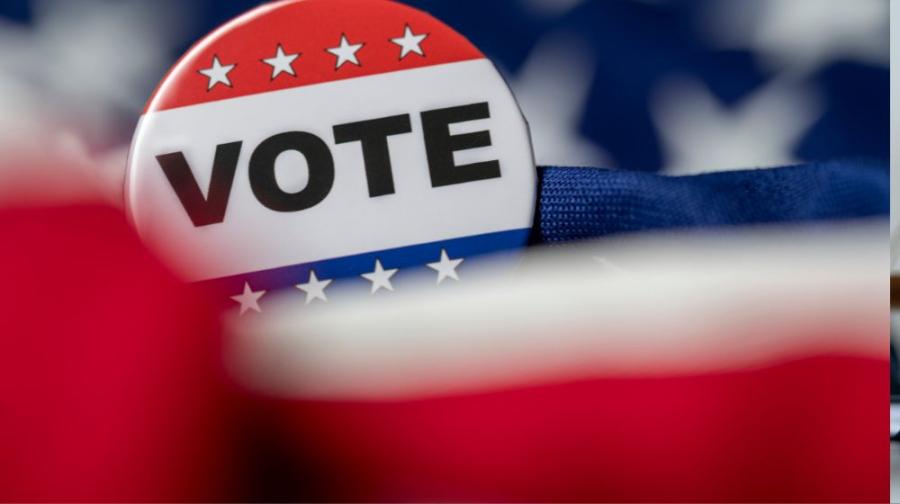 Vote pin on flag