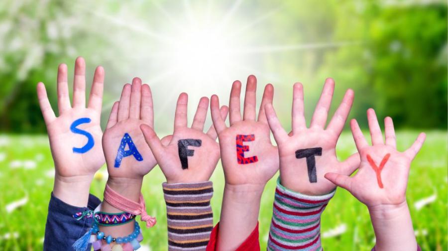childrens hands with letters on them