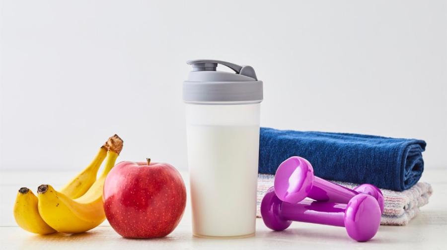 fruit, milk, and hand weights