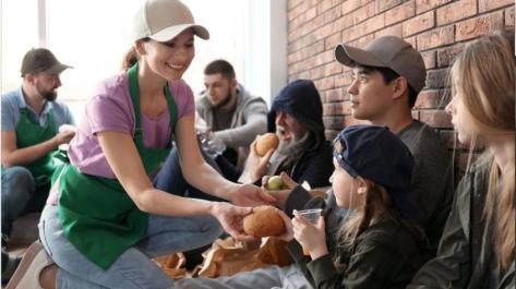 giving bread to people