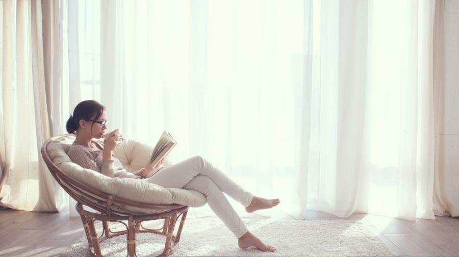 woman reading in chair